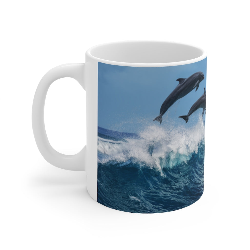 Dolphins jumping waves Ceramic Mug 11oz