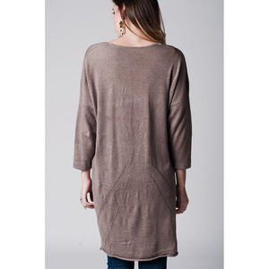 Beige long knit sweater with deep V neck