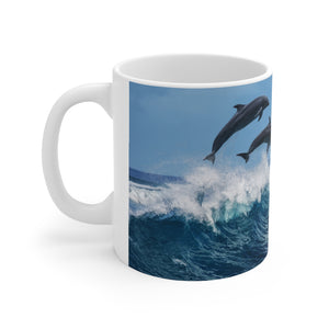 Dolphins jumping in water Ceramic Mug 11oz