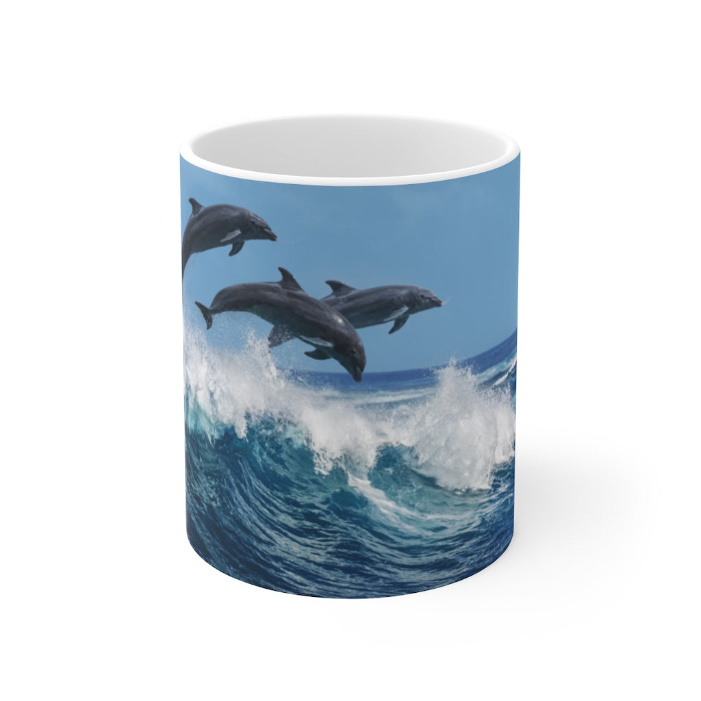 Dolphins jumping waves Ceramic Mug 11oz