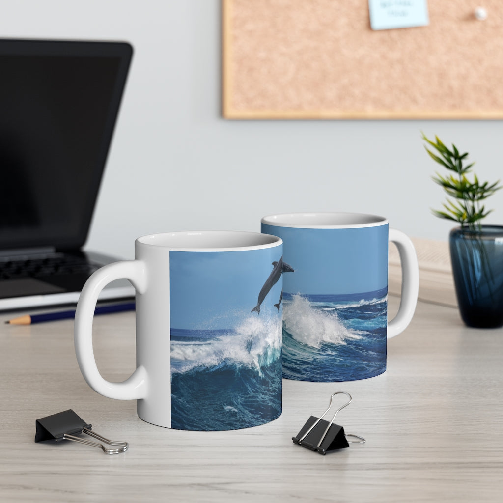 Dolphins jumping waves Ceramic Mug 11oz