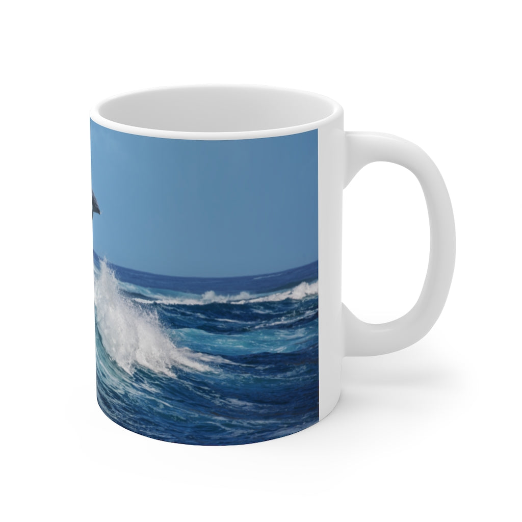 Dolphins jumping waves Ceramic Mug 11oz